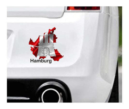 Das Bild zeigt den Umriss des Bundesland Hamburgs mit dem Wappen Hamburgs. Dazu steht über dem Bild der Schriftzug Hamburg. Erhältlich ist dieser Artikel mit der Schrift und Umrandung in Weiß oder Schwarz. Man kann auch nur das Abbild Hamburgs ohne Schriftzug bzw. Text erhalten.